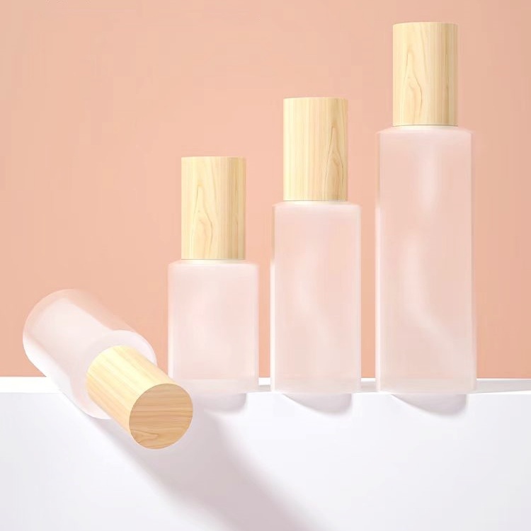 Recyclable Luxury 30g 50g 50ml 100ml Cosmetics Frosted Glass Serum Lotion Mist Spray Bottles and Amber Glass Cream Jars Set