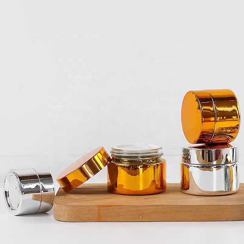Hot Sale 30ml 50ml 100ml Face Cream Jar Gold Sliver UV Cosmetic Glass Cosmetic Jar With Aluminum Lid