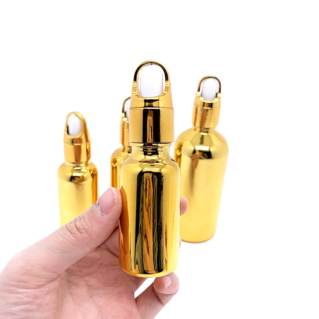 In Stock Empty Cosmetic Gold Drop Bottle 30ml 10 ml 100ml Glass Pipette Bottle With Flower Basket Dropper Cap